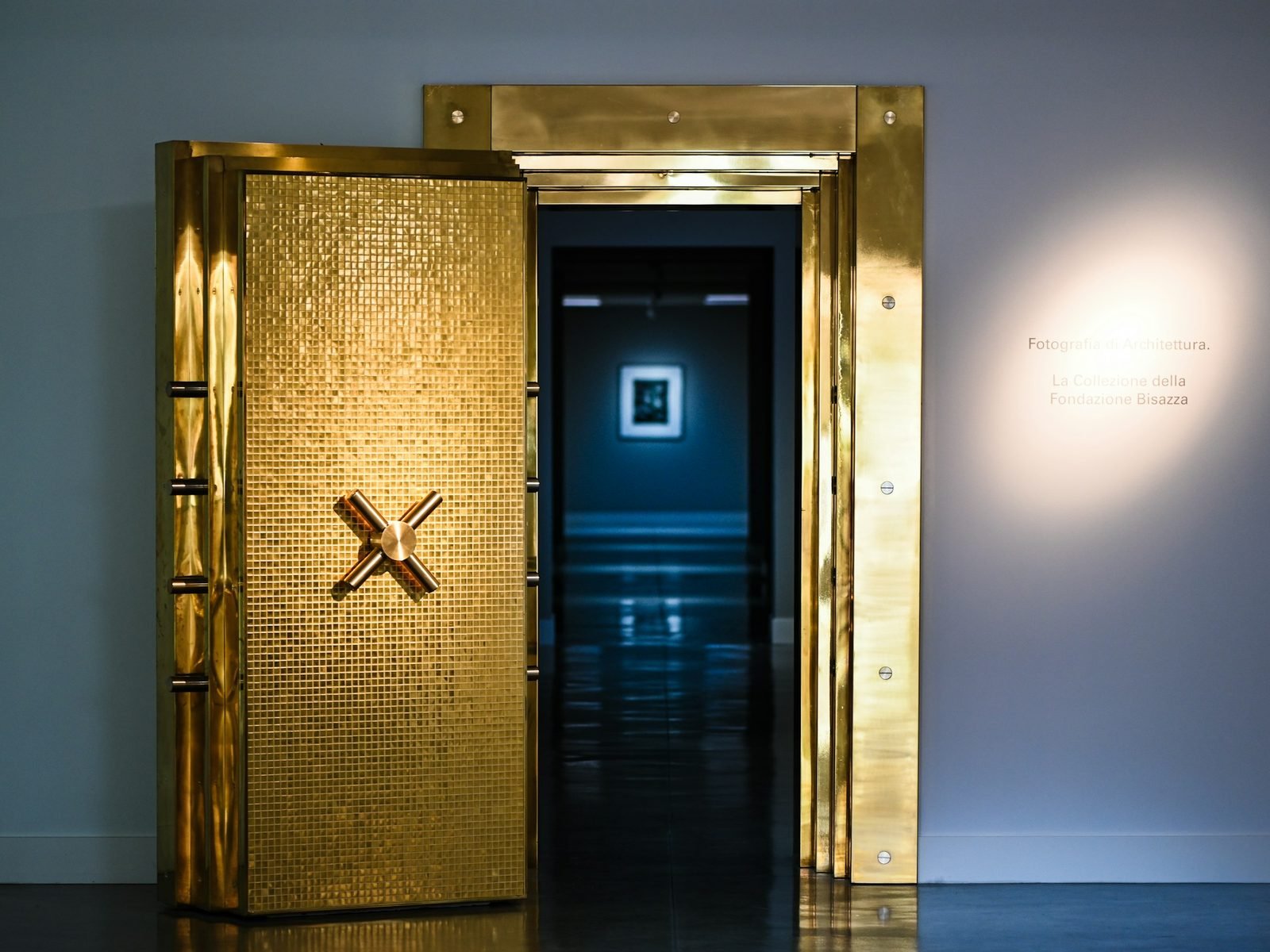 A heavy vault door standing open